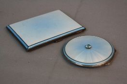 A MATCHING GEORGE VI SILVER AND TWO TONE BLUE ENAMEL POWDER COMPACT AND CIGARETTE CASE, the circular