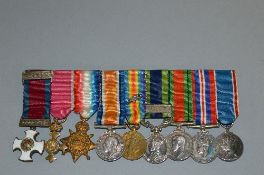A PERIOD GROUP OF MINIATURE MEDALS, on a wearing bar, attributed(by vendor) to a Brigadier John