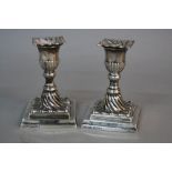 A PAIR OF VICTORIAN SILVER DWARF CANDLESTICKS, removable wavy square sconces with gadrooned