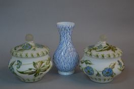 A PAIR OF 20TH CENTURY WHITE OPAQUE JARS AND COVERS, painted throughout with a trailing cornflower