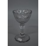 A GEORGIAN SILESIAN STEMMED SWEETMEAT GLASS, circa 1770, wavy rims, facet cut bowl, height