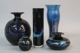 FOUR PHOENICIAN (MALTA) GLASS VASES OF VARIOUS DESIGNS, dark blue/black ground with blue, yellow,