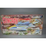 A BOXED MATCHBOX STINGRAY ACTION SUBMARINE, No.SR220, appears complete with instructions and four