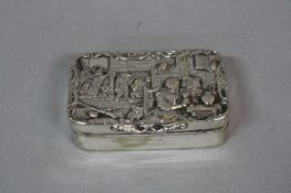 A 19TH CENTURY CONTINENTAL WHITE METAL RECTANGULAR SNUFF BOX, the hinged cover cast with a Dutch