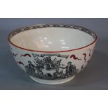 A 19TH CENTURY POTTERY BOWL, transfer printed in monochrome to the interior with 'Ship Caroline'