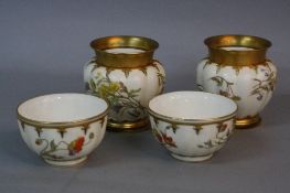 A PAIR OF ROYAL WORCESTER IVORY GROUND SUGAR BOWLS, of lobed circular form, printed and tinted
