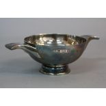 AN ELIZABETH II SILVER QUAICH, twin handles, stepped circular foot, makers mark for Barker Ellis