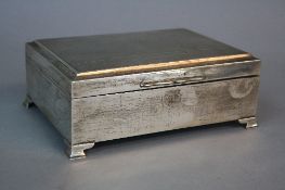 A MODERN SILVER CIGARETTE BOX, of rectangular form, engine turned top, on ogee bracket feet, bears