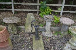 TWO STADDLE STONES, with later concrete tops and another staddle stone base (3)