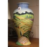 A LARGE OLD TUPTON WARE VASE, tube lined Landscape and Village scene by Jeanne McDougall