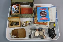 A MIXED LOT, to include 9ct cufflinks, silver fob, stamps, coins and booklets