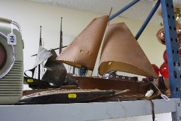 A TABLE LAMP IN THE FORM OF A SHIP, together with a model galleon and two other wooden boats (4)