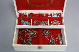 A JEWELLERY BOX WITH VARIOUS SILVER JEWELLERY, including rings, chains, etc