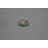 AN EARLY 20TH CENTURY 18CT GOLD TURQUOISE AND DIAMOND HALF HOOP RING, scroll design shoulders, total