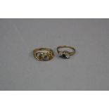 TWO LATE 20TH CENTURY SAPPHIRE AND DIAMOND DRESS RINGS, one scroll design, ring size N,