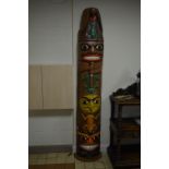 A MODERN TOTEM POLE, made from fibre glass, approximate height 340cm