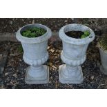 A PAIR OF PRE-CAST COMPANA GARDEN URNS