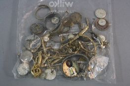 A BAG OF ASSORTED WATCH PARTS etc