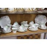 A SHELLEY TEA SET, Perth shape, Reg No 781613, painted SS.0234, green factory mark, to include two