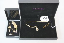 THREE PAIR OF YELLOW METAL NECKLACE AND EARRINGS SETS