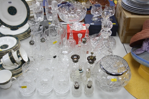 A COLLECTION OF GLASSWARE, including silver mounted scent and toilet bottles