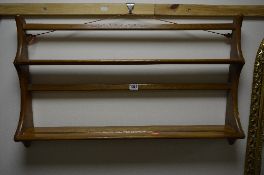 AN ERCOL TWO TIER HANGING PLATE RACK