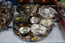 A FOUR PIECE ELKINGTON PLATED TEA SERVICE, together with a three piece Elkington tea service and a