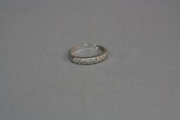 A 9CT DIAMOND BAND RING, ring size M, approximate size 2.2 grams