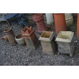 TWO VARIOUS TERRACOTTA CHIMNEY POTS, a pair of chimney pots, a terracotta chimney pot topper and a