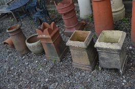 TWO VARIOUS TERRACOTTA CHIMNEY POTS, a pair of chimney pots, a terracotta chimney pot topper and a