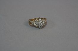 A MODERN 9CT GOLD DIAMOND FANCY CLUSTER RING, estimated total modern round brilliant cut weight 0.