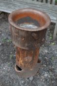 A TREACLE GLAZED PLANTER, on a seperate base in the form of a tree stump