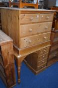 A PINE CHEST, of two short and two long drawers and a pine desk with four drawers (sd) (2)
