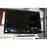 A SHARP LC 32DH 32' LCD TV (remote)