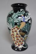 A LARGE BOXED OLD TUPTON WARE VASE, tubed lined Peacocks decorated, approximate height 37.5cm