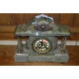 A ONYX MANTLE CLOCK, signed Ansonia, New York (winding key)