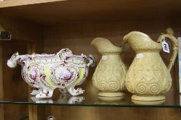 A PAIR OF MID 19TH CENTURY RIDGWAY TYPE JUGS, pan and Bacchus design, buff colour, approximate
