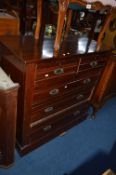 AN EDWARDIAN MAHOGANY CHEST, of two short and three long drawers, approximate size width 105cm x