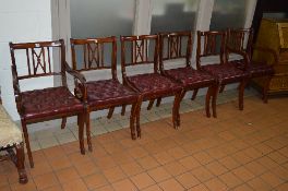 A SET OF SIX MODERN MAHOGANY DINING CHAIRS, with burgundy buttoned leather drop in seat pads