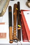 A VICTORIAN TURNED AND PAINTED POLICE TRUNCHEON, with ring turned handle, approximate length 40cm,