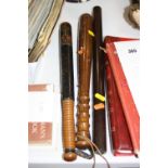 A VICTORIAN TURNED AND PAINTED POLICE TRUNCHEON, with ring turned handle, approximate length 40cm,