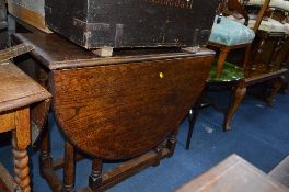 AN OAK GATE LEG TABLE, and a mahogany occasional table with painted top (2)