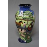 A LARGE BOXED OLD TUPTON WARE VASE, tube lined farmyard scene, approximate height 36.5cm