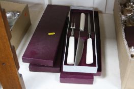 FOUR VARIOUS CARVING SETS