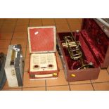 A CAVALIER TRANSISTOR RADIO, a vidor radio and a cased brass trumpet (3)