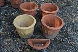 FOUR VARIOUS TERRACOTTA PLANT POTS, and a wall mounted plant pot (sd) (5)