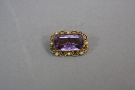 A MID 20TH CENTURY AMETHYST AND SPLIT PEARL RECTANGULAR SHAPED BROOCH, filigree twist rope design,