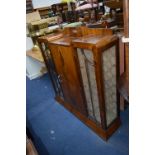 AN ART DECO WALNUT SIDE BY SIDE CHINA CABINET