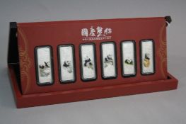 SIX BOXED CHINESE SILVER INGOTS, approximately 20 grams each, (certificates)