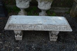 A PAINTED PRE-CAST GARDEN BENCH ON SEPERATE LEGS, approximate length 132cm (sd)